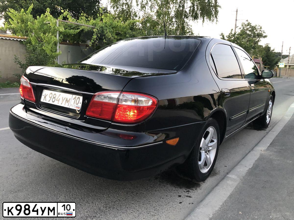 Фото автомобиля NISSAN MAXIMA, 2000 — госномер Р064ВТ82. Цвет: ЧЕРНЫЙ