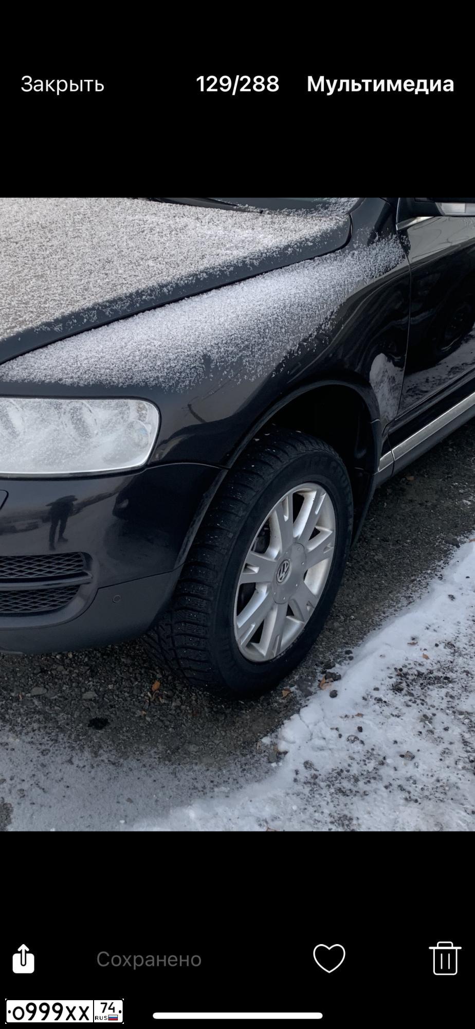 Фото автомобиля VOLKSWAGEN TOUAREG, 2004 — госномер Е777АЕ174. Цвет: ЧЕРНЫЙ