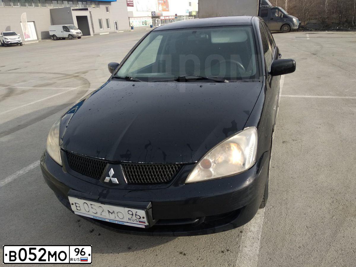 Фото автомобиля MITSUBISHI LANCER, 2006 — госномер В052МО96. Цвет: ЧЕРНЫЙ