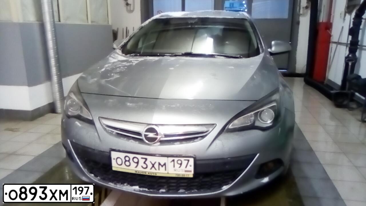 Фото автомобиля ОПЕЛЬ АСТРА GTC P-J/SW, 2012 — госномер А750ВУ252. Цвет: СЕРЫЙ