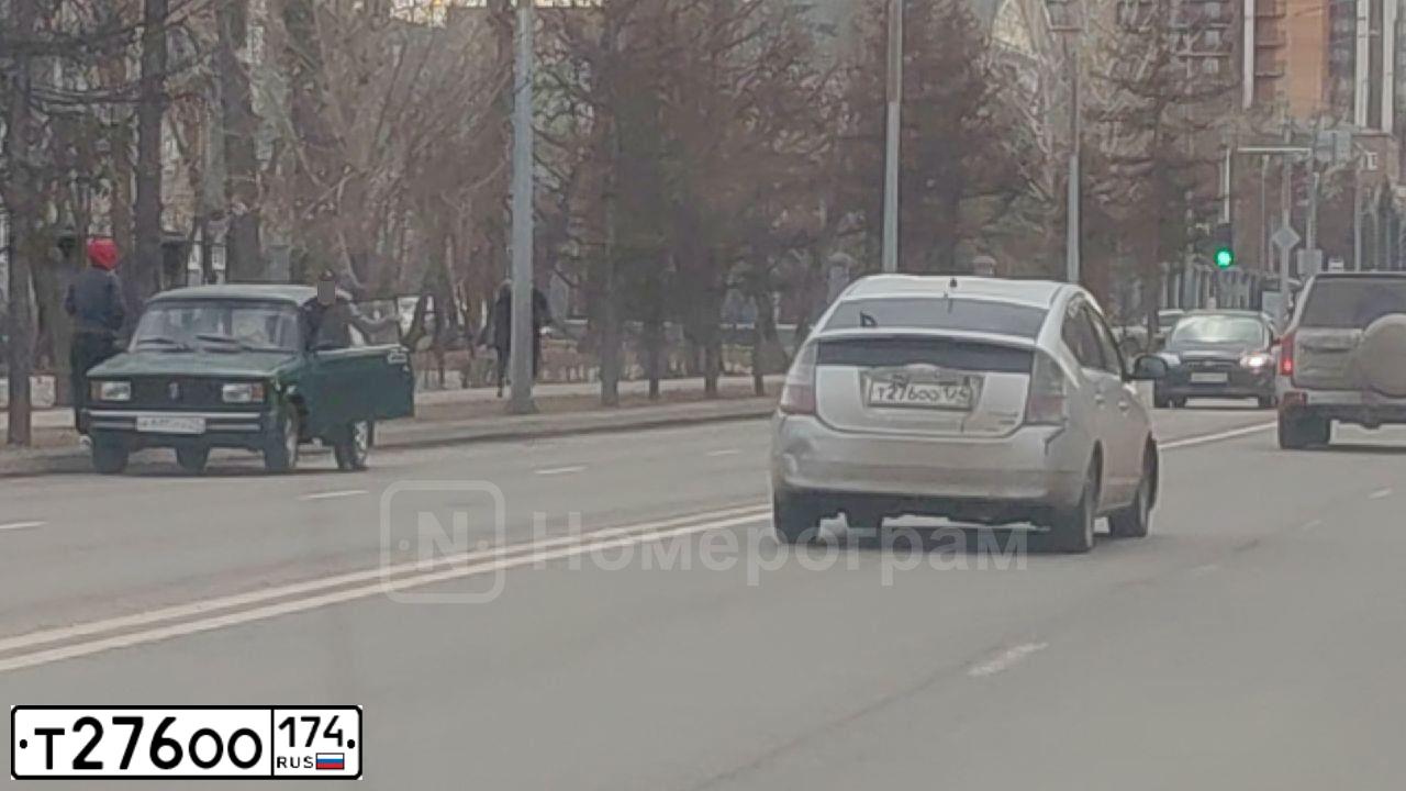 Фото автомобиля FORD FOCUS, 2012 — госномер Т276ОО174. Цвет: СЕРО-ГОЛУБОЙ