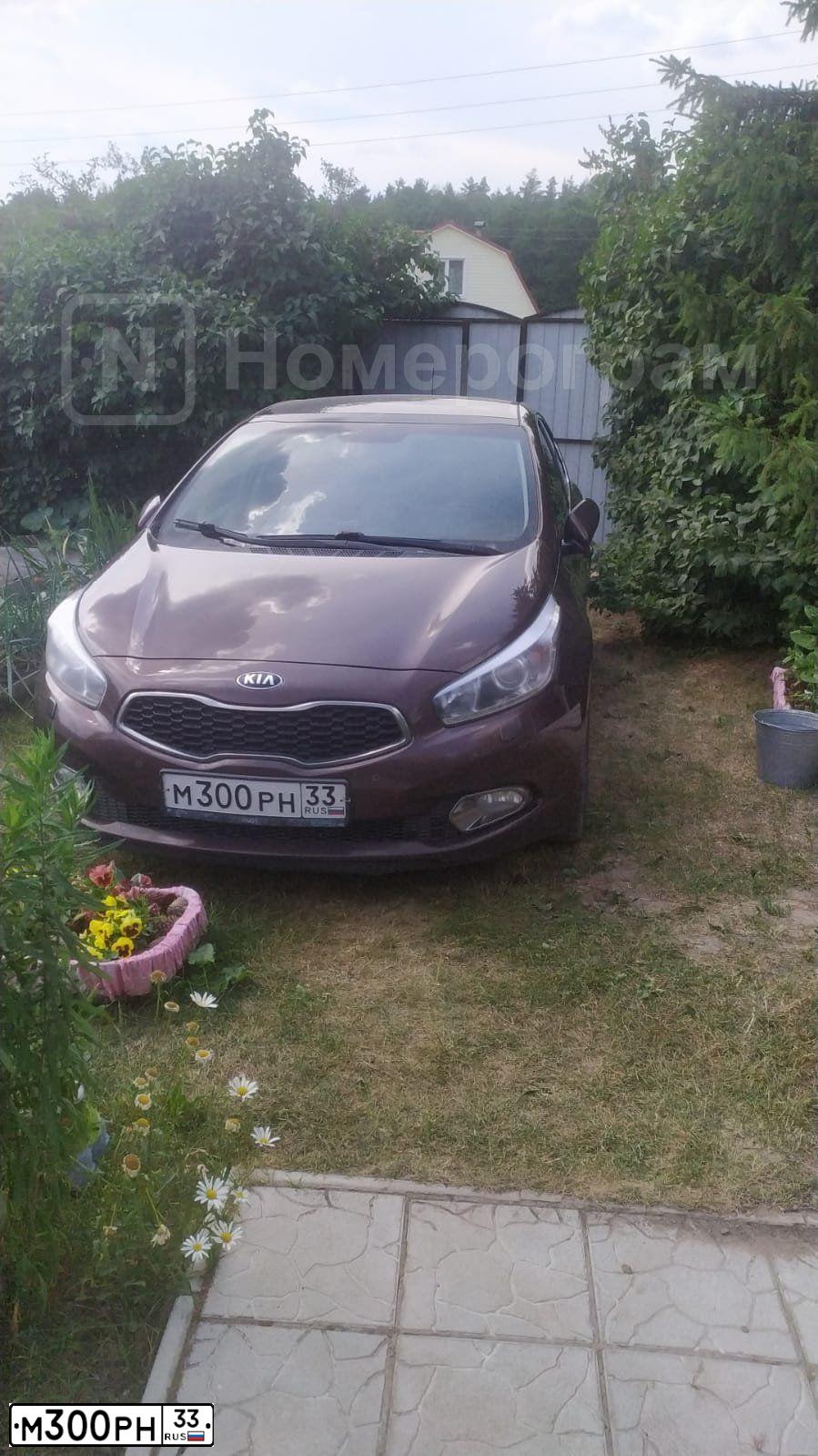 Фото автомобиля KIA CEE'D, 2014 — госномер М300РН33. Цвет: Коричневый