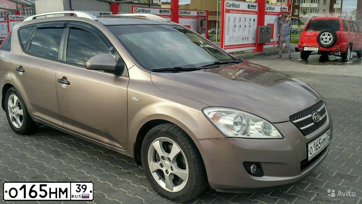 Фото автомобиля KIA CEE'D, 2008 — госномер О165НМ39. Цвет: БЕЖЕВЫЙ