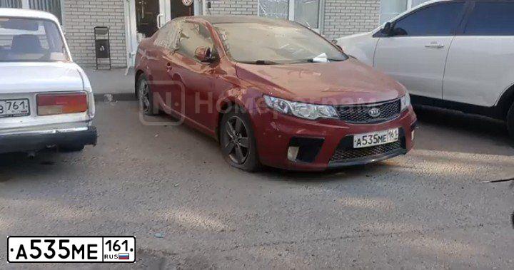 Фото автомобиля KIA CERATO, 2010 — госномер А535МЕ161. Цвет: КРАСНЫЙ