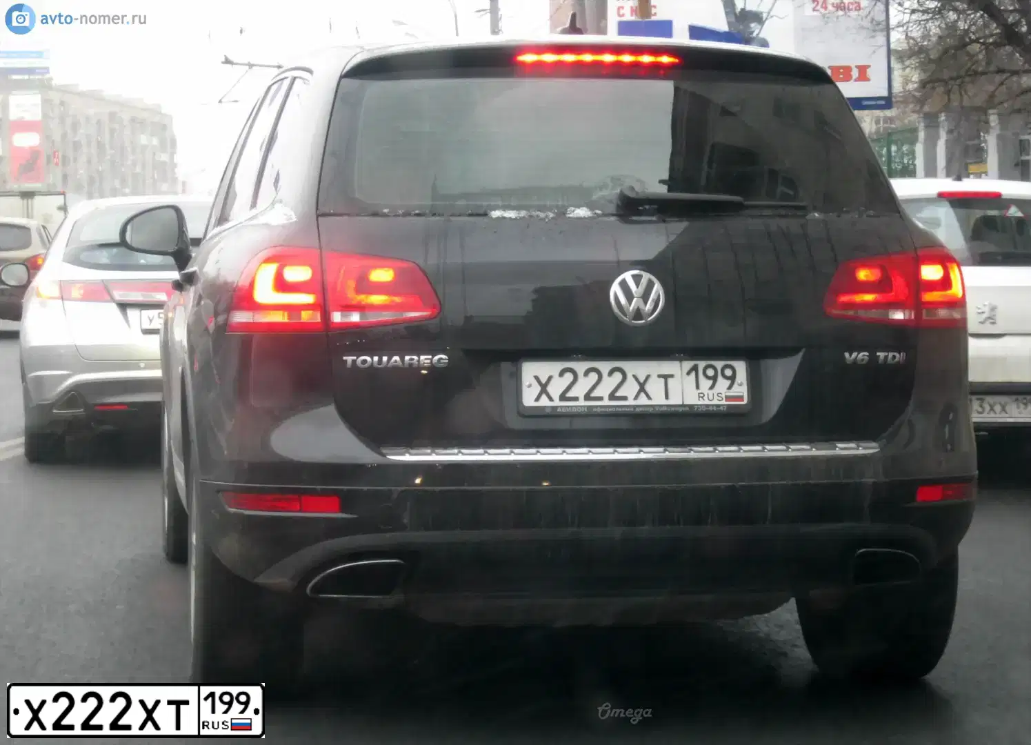 Фото автомобиля VOLKSWAGEN TOUAREG, 2011 — госномер Х222ХТ199. Цвет: ЧЕРНЫЙ
