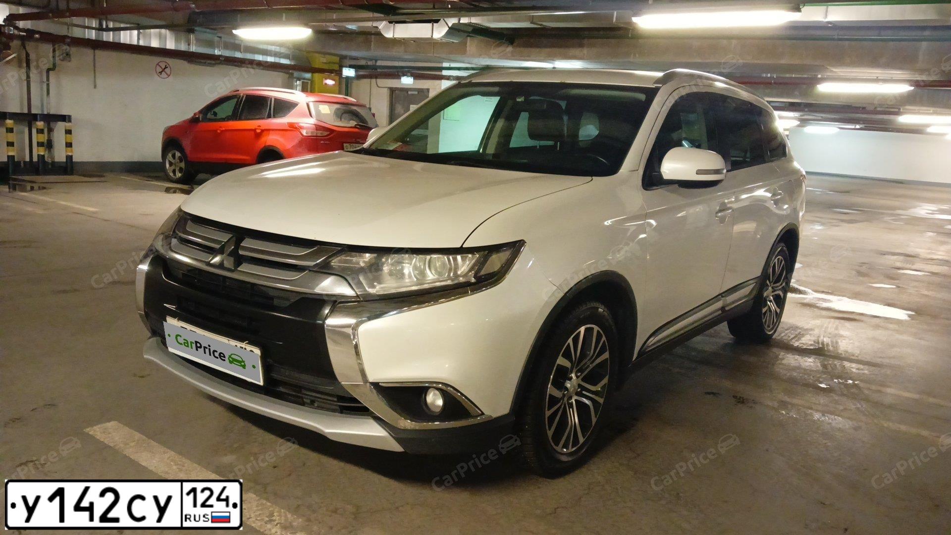 Фото автомобиля MITSUBISHI OUTLANDER, 2016 — госномер У142СУ124. Цвет: Белый