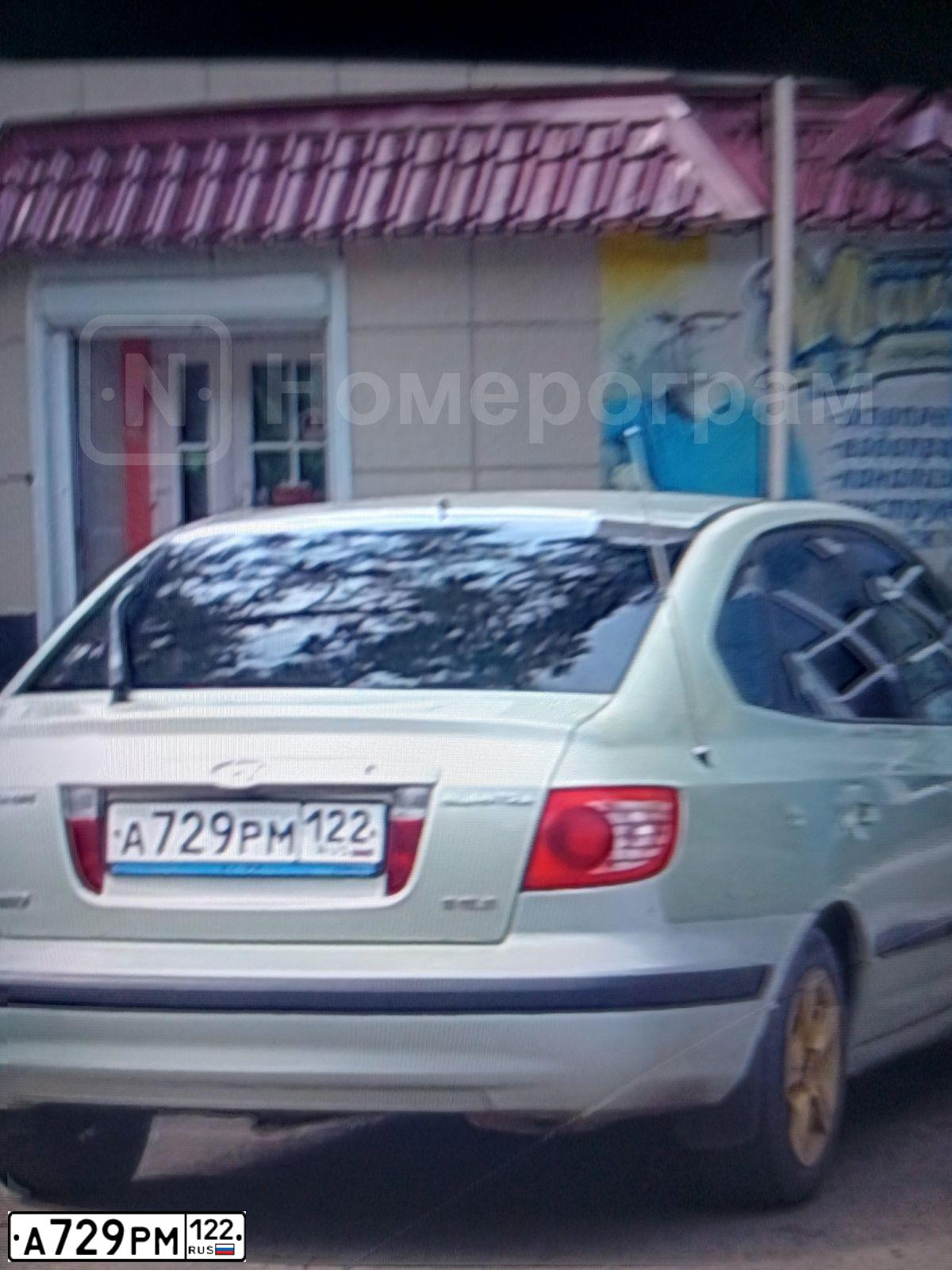 Фото автомобиля HYUNDAI ELANTRA, 2004 — госномер А729РМ122. Цвет: СВЕТЛО-СЕРО-ЗЕЛЕНЫЙ