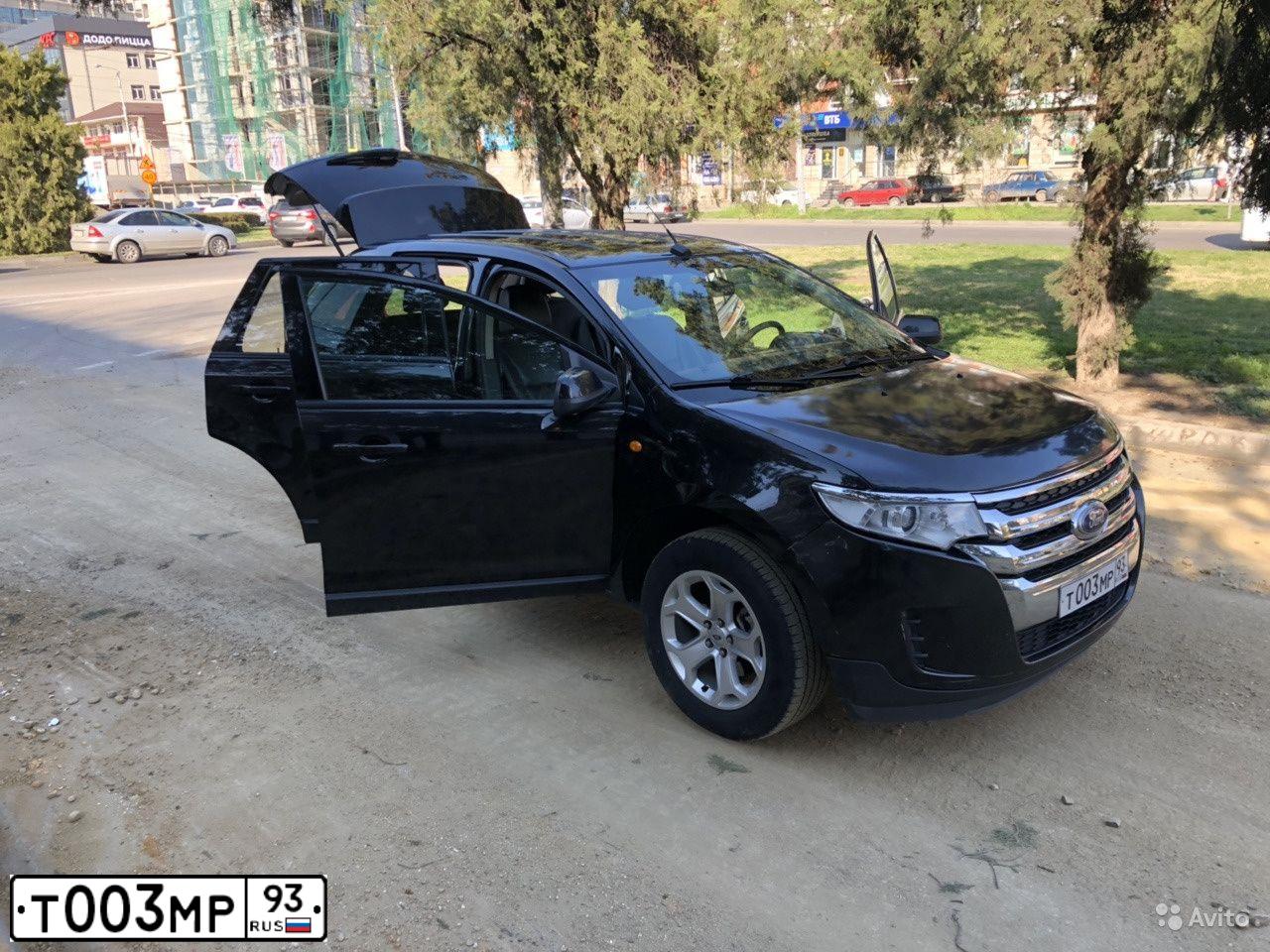 Фото автомобиля OPEL ASTRA, 2012 — госномер Т003МР93. Цвет: Белый