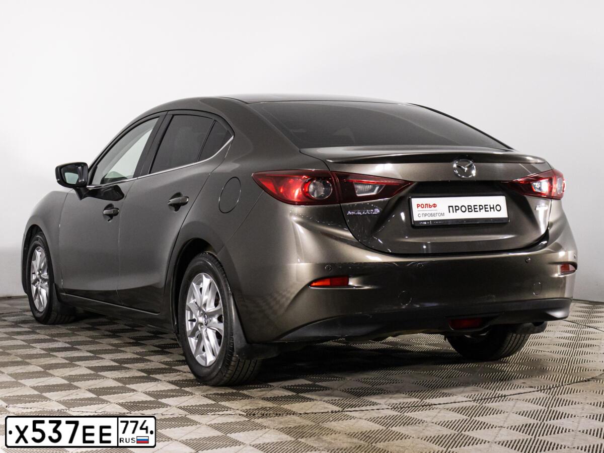 Фото автомобиля MAZDA 3, 2018 — госномер Х537ЕЕ774. Цвет: СЕРО-КОРИЧНЕВЫЙ