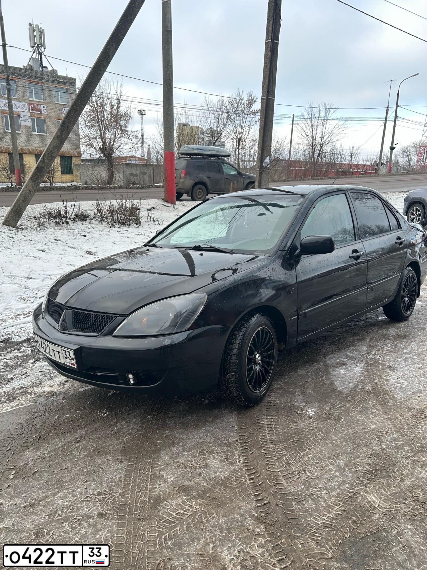 Фото автомобиля MITSUBISHI LANCER, 2007 — госномер О422ТТ33. Цвет: ЧЕРНЫЙ