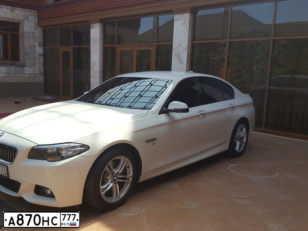 Фото автомобиля BMW SERIE 5, 2014 — госномер О235НЕ31. Цвет: Белый