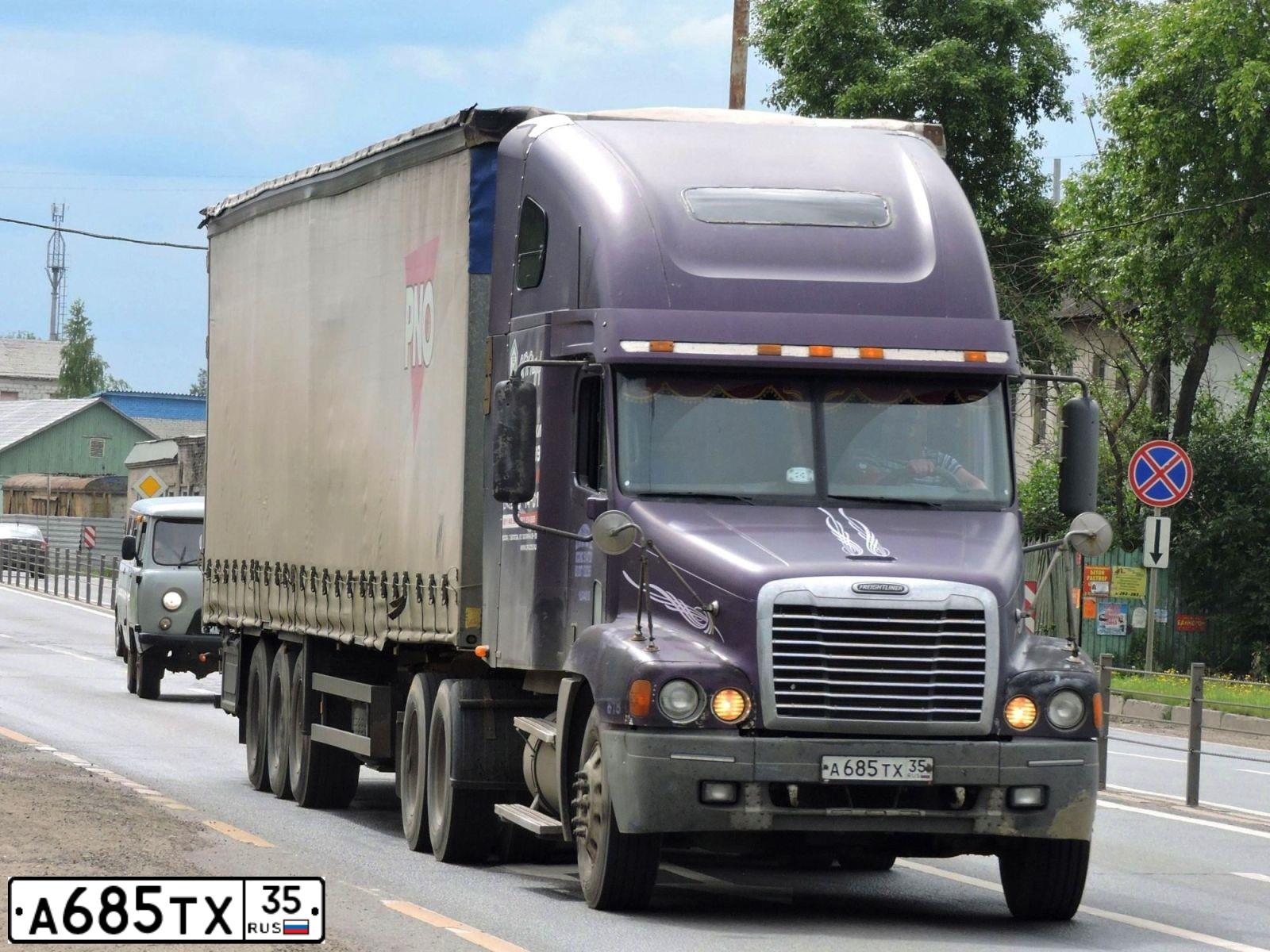 Фото автомобиля FREIGHTLINER CENTURY S/T, 2001 — госномер Е887ТР716. Цвет: БАКЛАЖАН