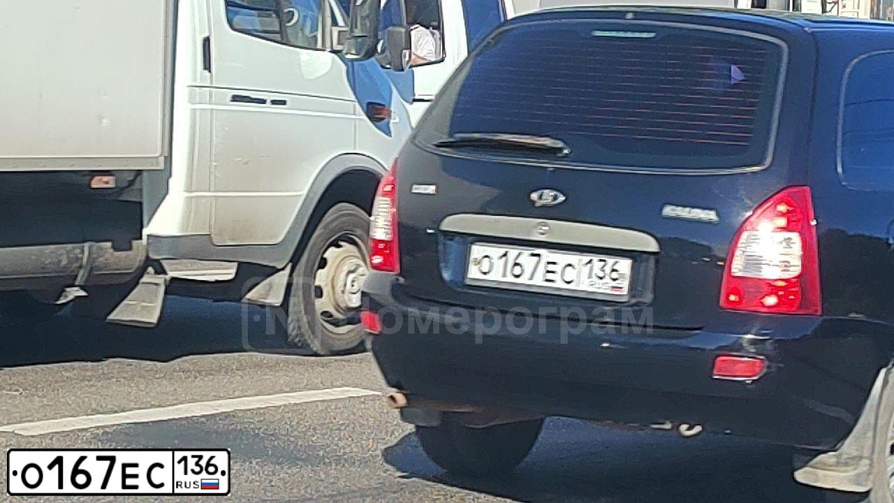 Фото автомобиля LADA 1117 KALINA, 2011 — госномер О167ЕС136. Цвет: ЧЕРНЫЙ