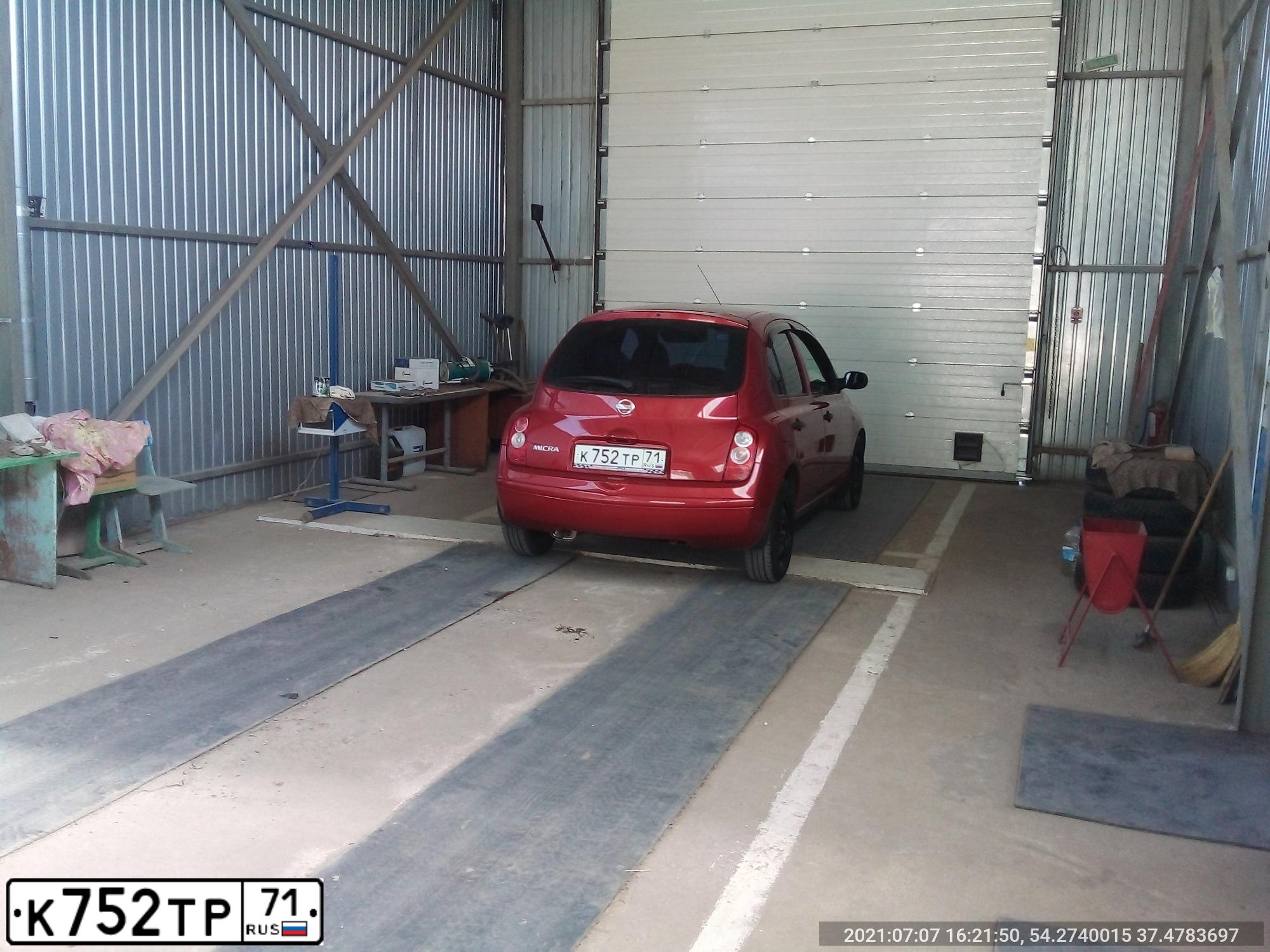 Фото автомобиля NISSAN MICRA, 2006 — госномер К752ТР71. Цвет: КРАСНЫЙ