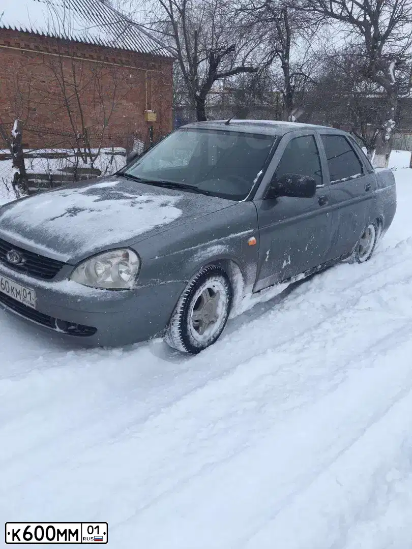 Фото автомобиля TOYOTA COROLLA, 2006 — госномер К600ММ01. Цвет: СЕРЕБРИСТЫЙ