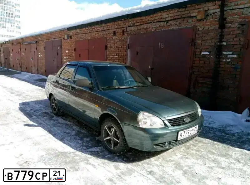 Фото автомобиля VOLVO S40, 2006 — госномер Н165ЕМ21. Цвет: Красный