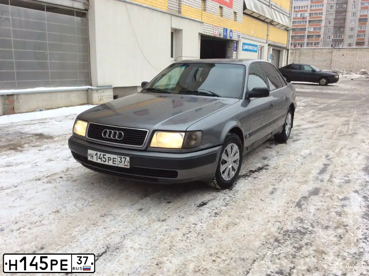 Фото автомобиля AUDI 100, 1991 — госномер Н145РЕ37. Цвет: Серый