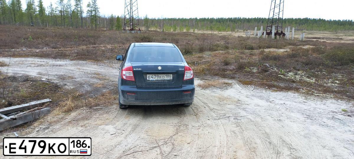 Фото автомобиля SUZUKI SX4, 2008 — госномер Х144РЕ196. Цвет: ЧЕРНЫЙ