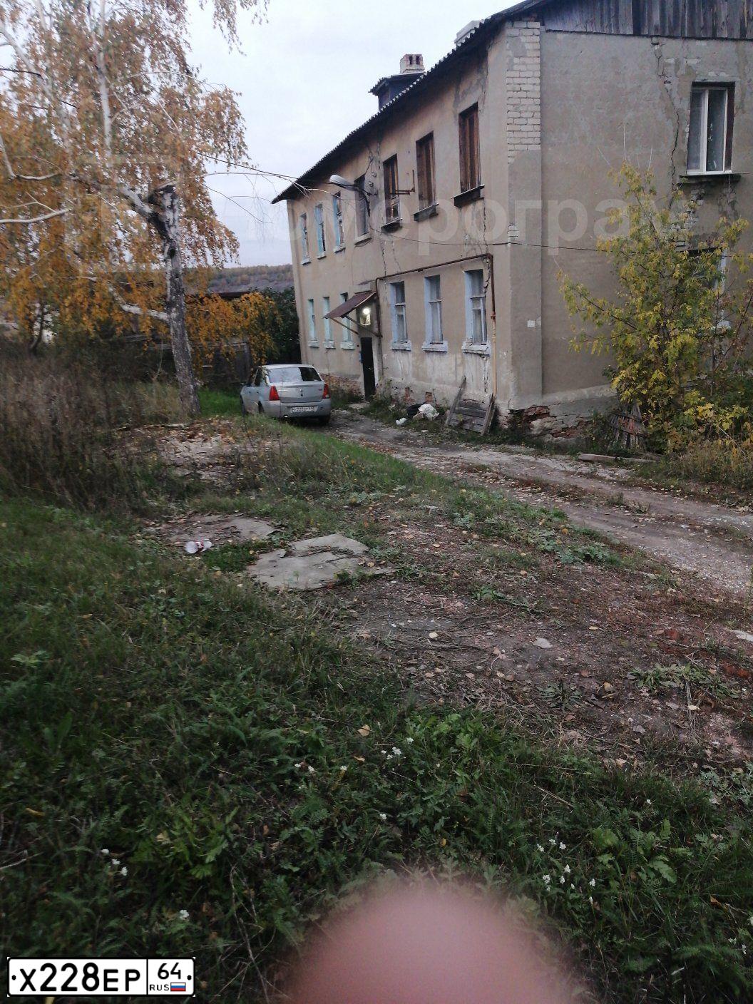 Фото автомобиля DAEWOO NEXIA, 2004 — госномер Х228ЕР64. Цвет: ТЕМНО СИНИЙ