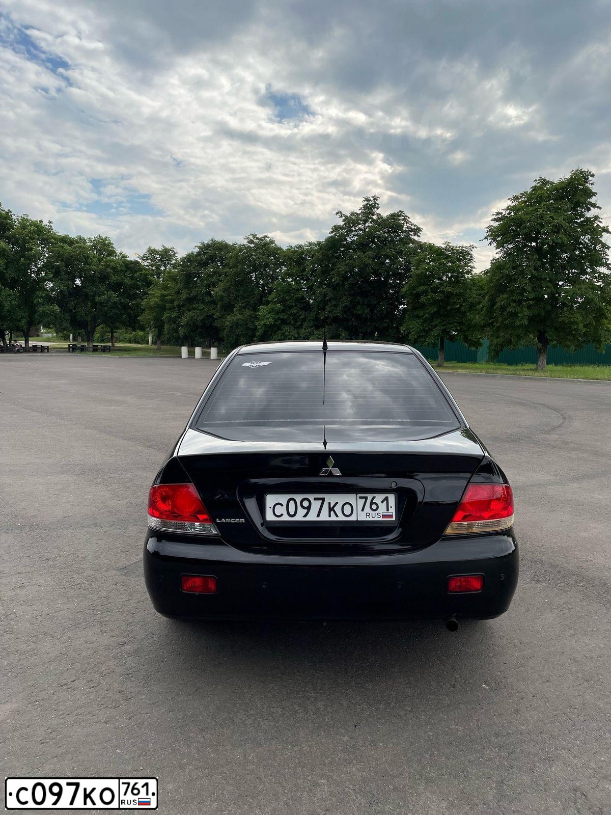 Фото автомобиля MITSUBISHI LANCER, 2007 — госномер С097КО761. Цвет: ЧЕРНЫЙ