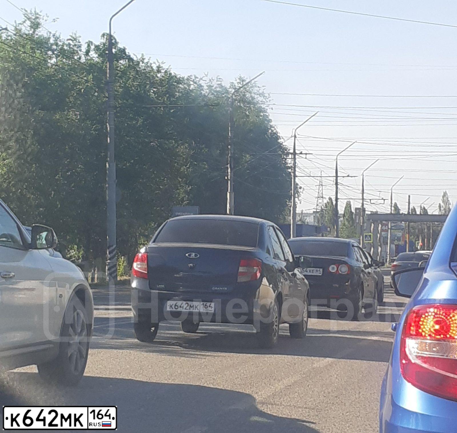Фото автомобиля LADA 2190 GRANTA, 2013 — госномер К642МК164. Цвет: Серо-Синий