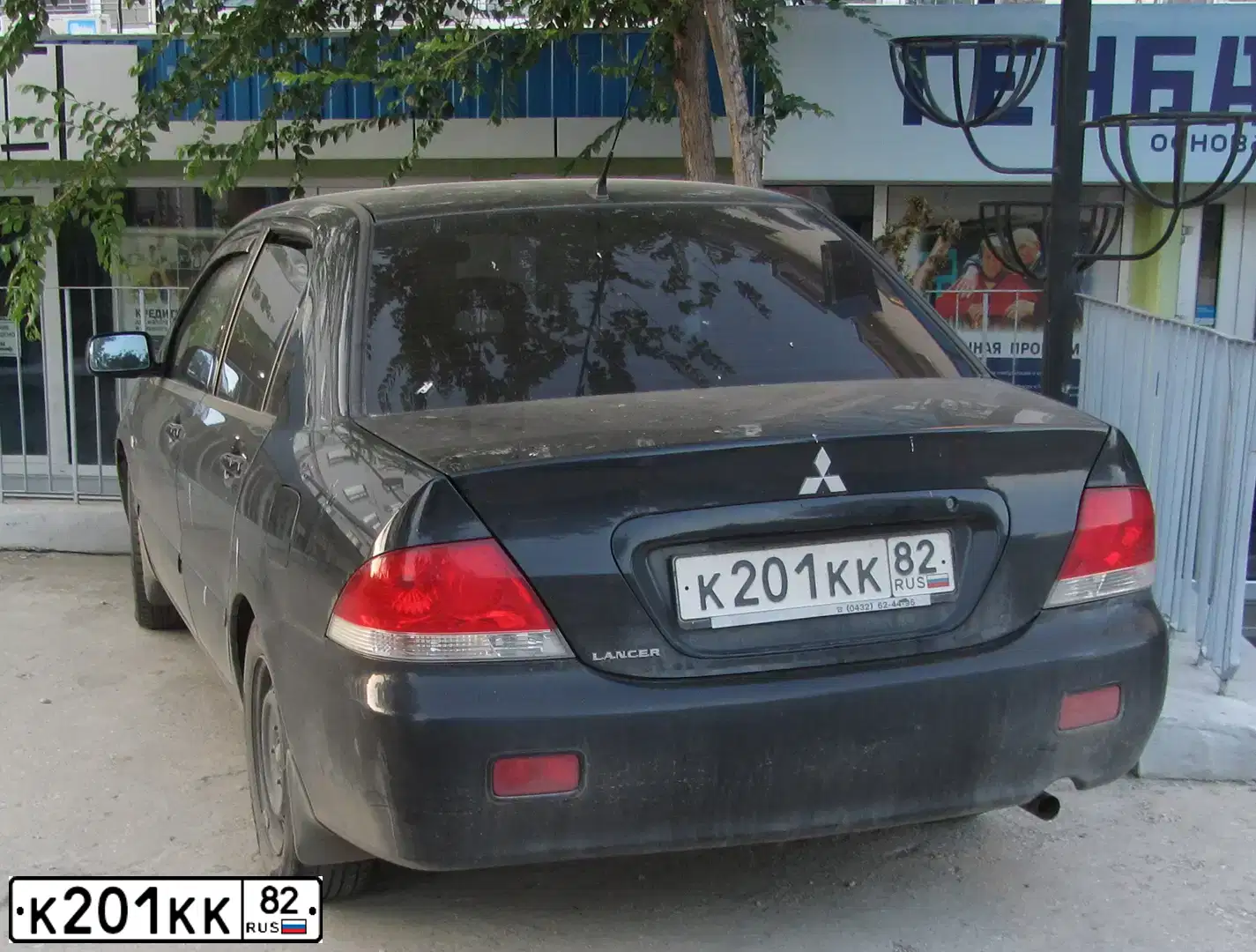 Фото автомобиля МИЦУБИСИ ЛАНСЕР 1.6, 2007 — госномер К201КК82. Цвет: ЧЕРНЫЙ