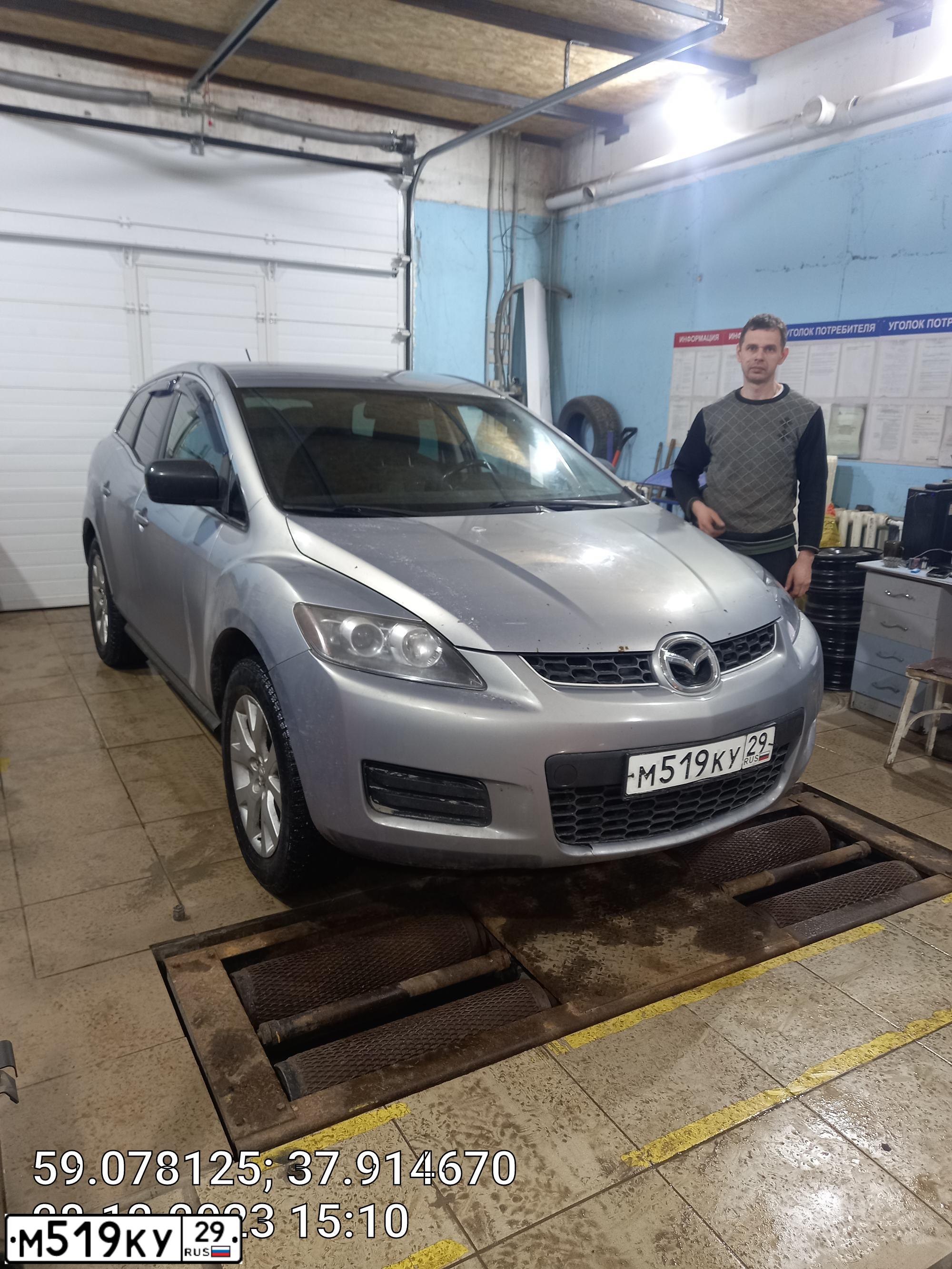 Фото автомобиля MAZDA CX-7, 2006 — госномер Т615ЕВ790. Цвет: белый(серый)