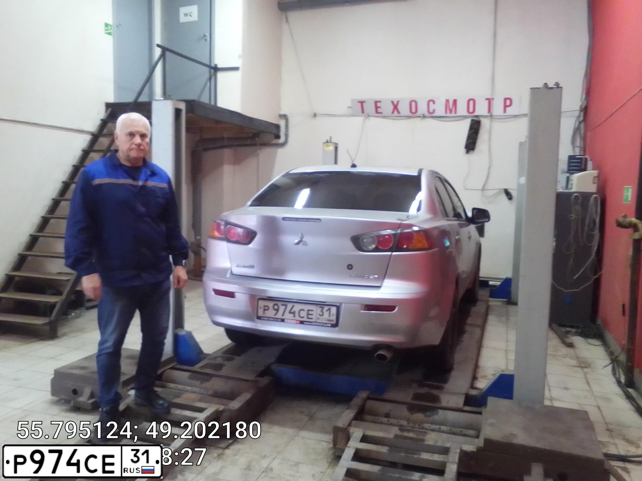 Фото автомобиля MITSUBISHI LANCER, 2010 — госномер Р974СЕ31. Цвет: СЕРЕБРИСТЫЙ