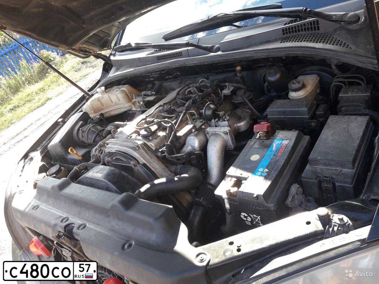 Фото автомобиля KIA SORENTO, 2002 — госномер Н844УС32. Цвет: ЧЕРНЫЙ СЕРЫЙ