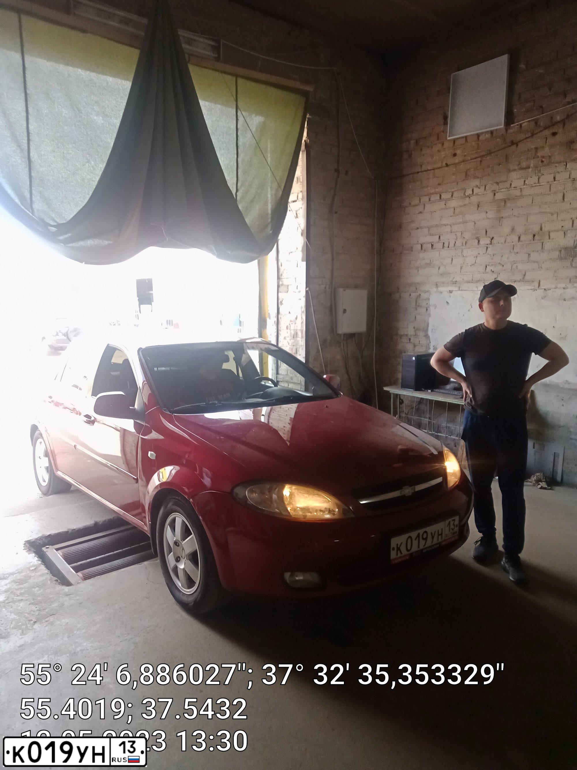 Фото автомобиля CHEVROLET T LACETTI, 2011 — госномер М230НС797. Цвет: Красный