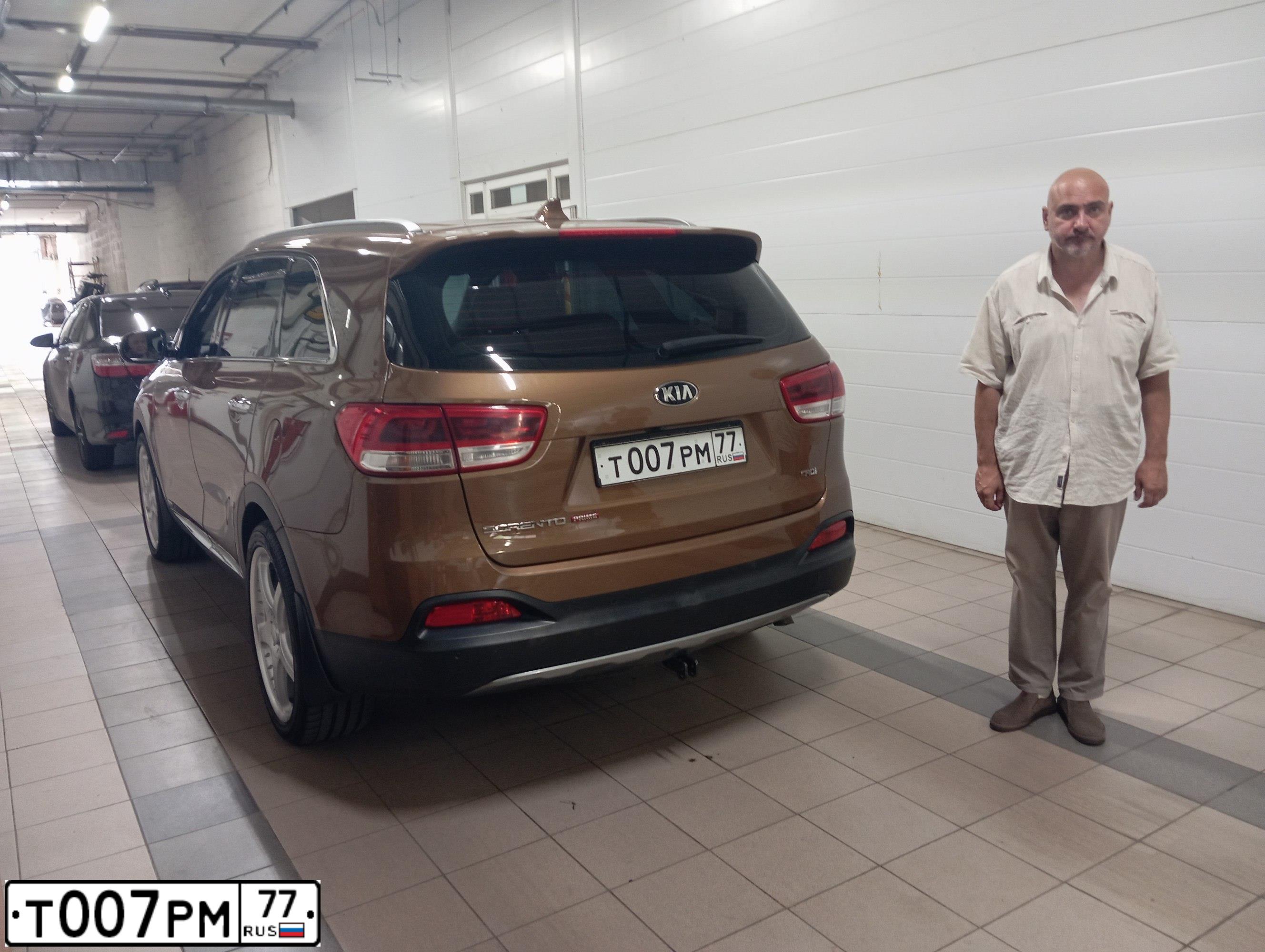 Фото автомобиля KIA UM (SORENTO), 2016 — госномер Х596ТУ797. Цвет: Коричневый