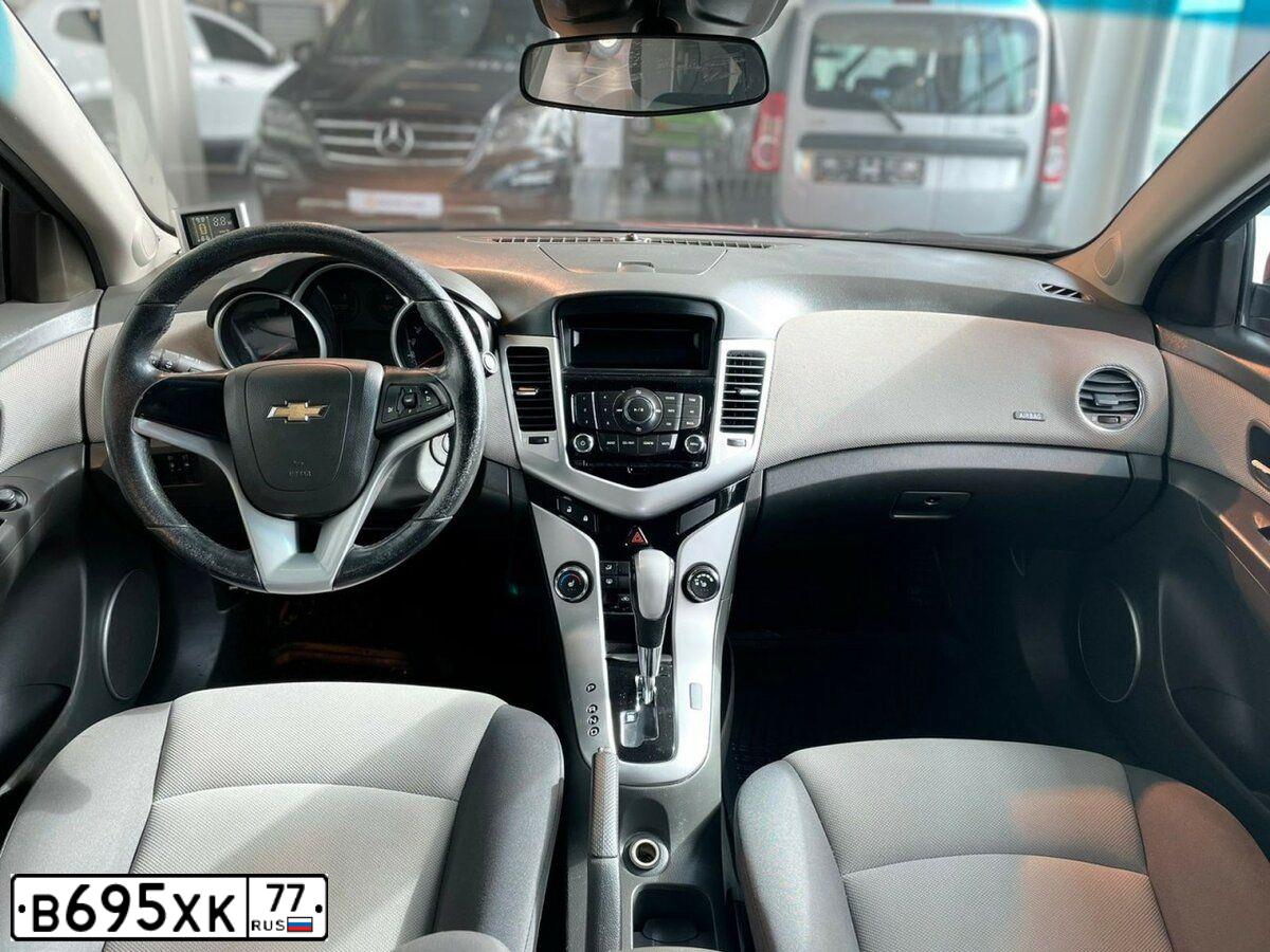 Фото автомобиля CHEVROLET CRUZE, 2010 — госномер К126ОК164. Цвет: Красный