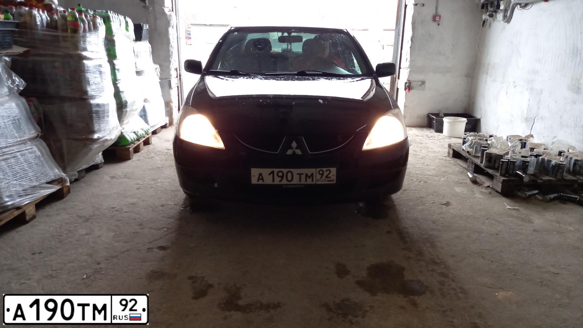 Фото автомобиля MITSUBISHI LANCER, 2005 — госномер Е746ТК82. Цвет: ЧЕРНЫЙ