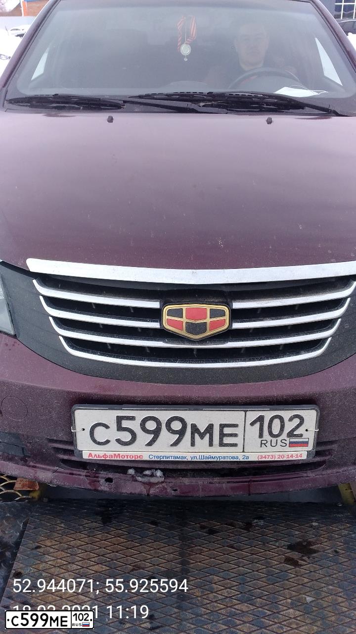 Фото автомобиля GEELY EMGRAND, 2013 — госномер М928СК702. Цвет: ЧЕРНЫЙ