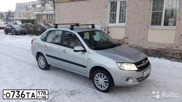 Фото автомобиля LADA GRANTA, 2013 — госномер Т745ТХ05. Цвет: Серебристый