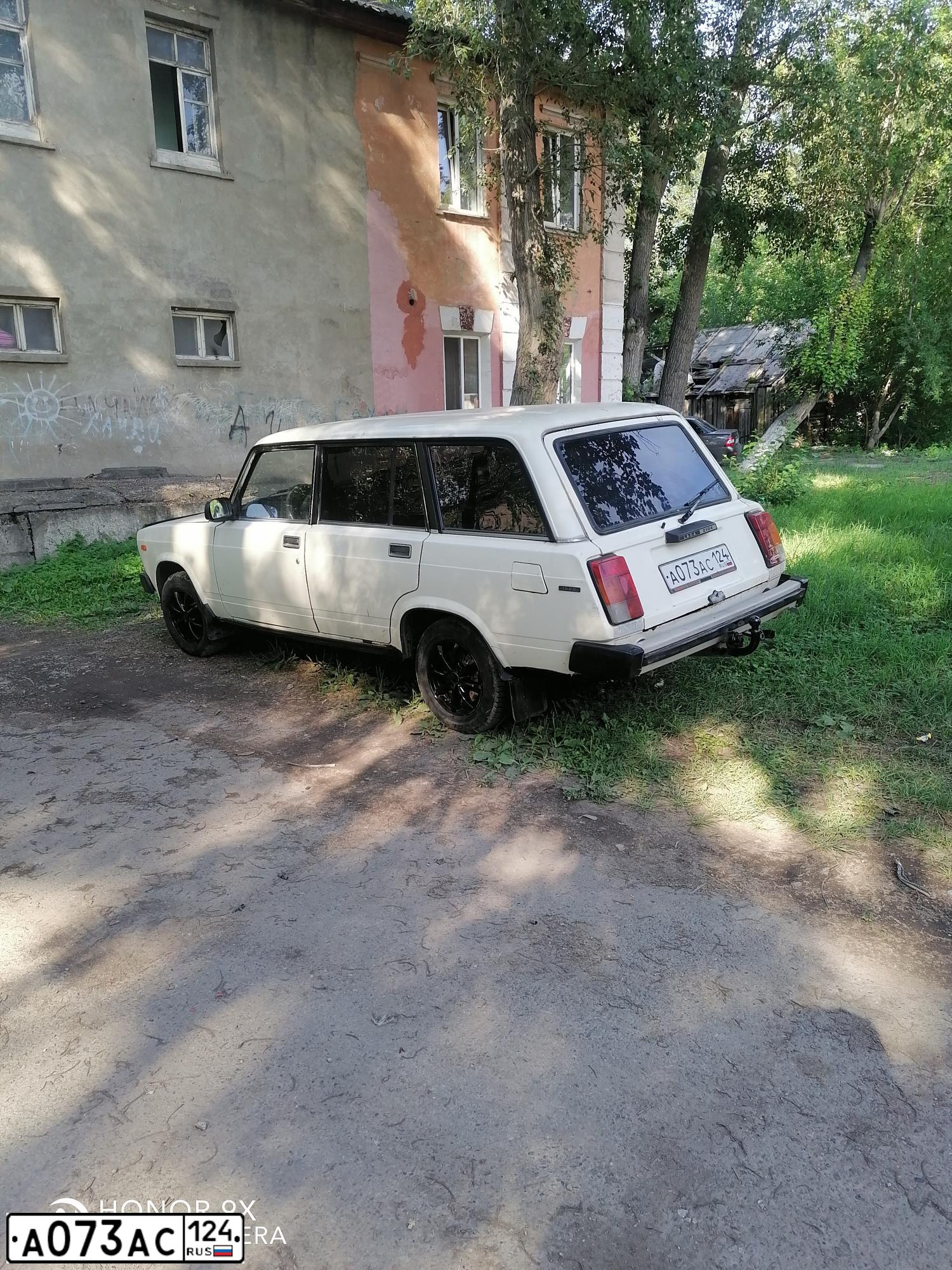 Фото автомобиля LADA 2104, 2000 — госномер М569СХ124. Цвет: Белый