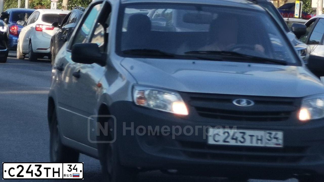 Фото автомобиля LADA 2190 GRANTA, 2012 — госномер С243ТН34. Цвет: СЕРЕБРИСТЫЙ