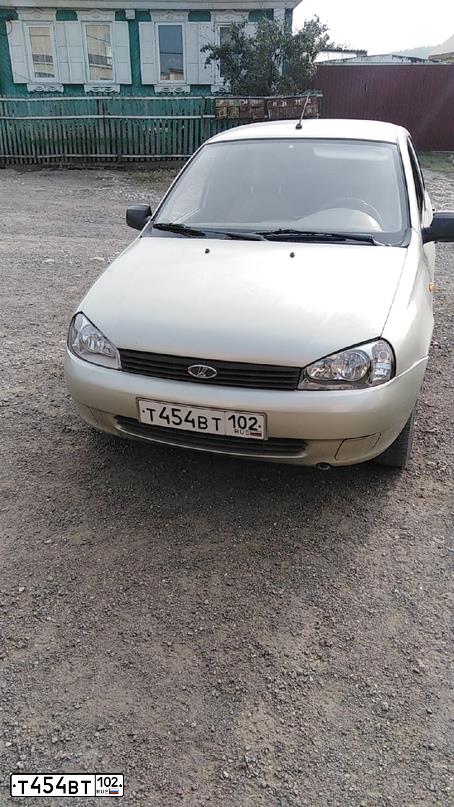 Фото автомобиля LADA 1119 KALINA, 2011 — госномер В835КУ702. Цвет: БЕЛО-ЖЕЛТЫЙ ПЕРЛАМУТРОВЫЙ