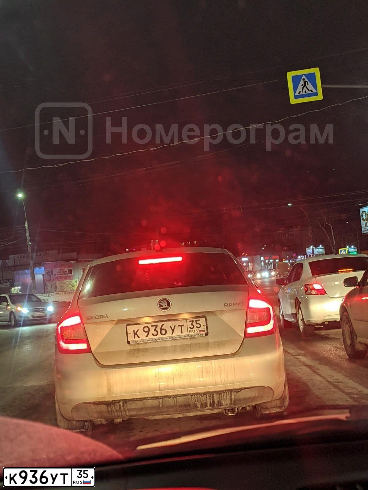 Фото автомобиля SKODA RAPID, 2015 — госномер К936УТ35. Цвет: Серебристо-Желтый