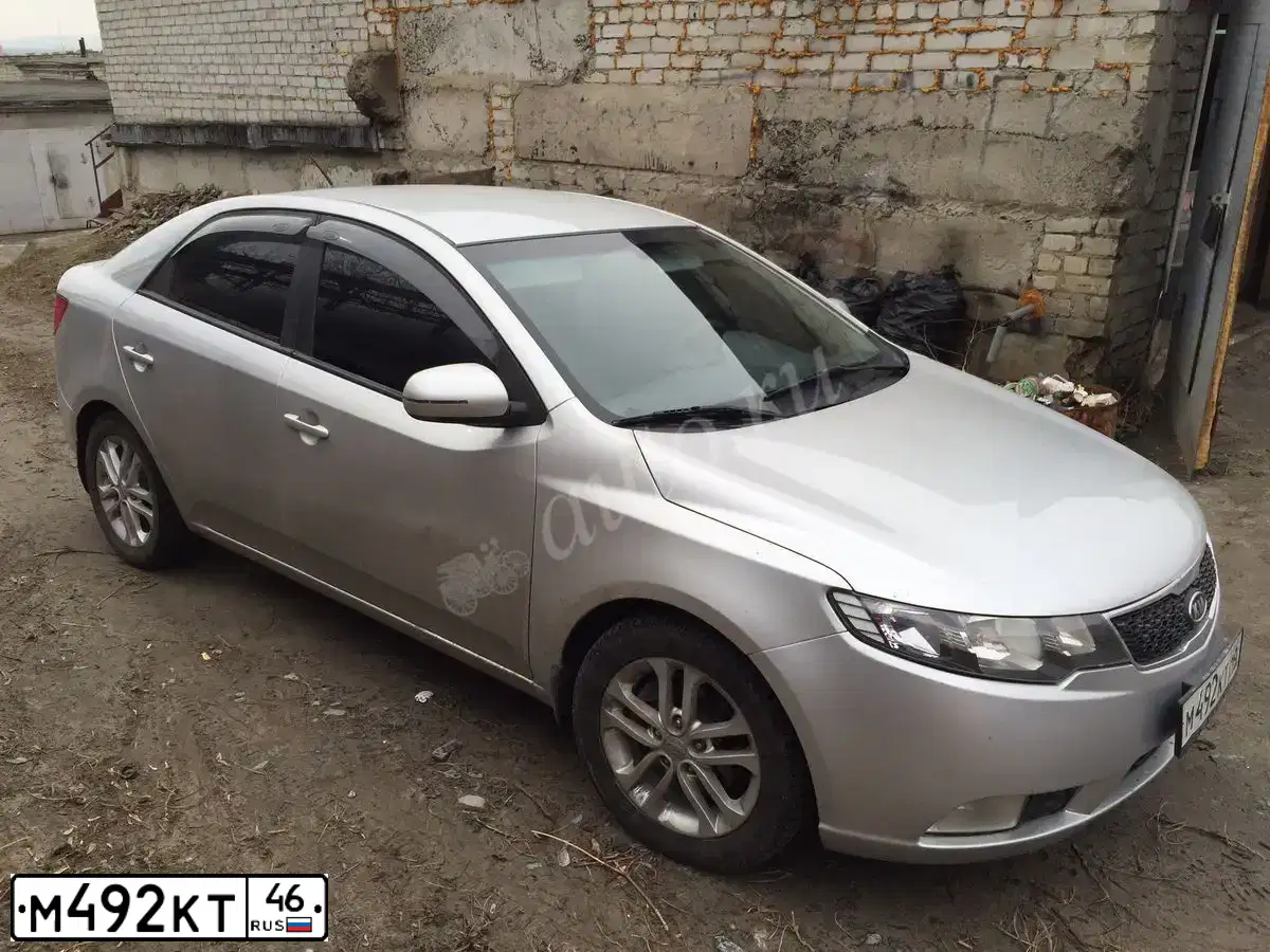 Фото автомобиля КИА CERATO, 2011 — госномер А155ЕХ136. Цвет: Серебристый