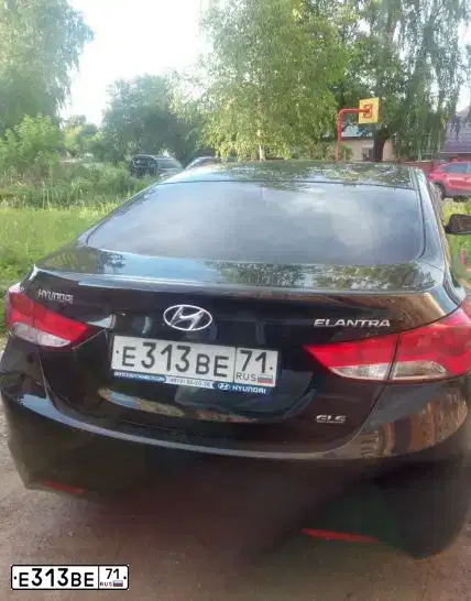 Фото автомобиля HYUNDAI ELANTRA, 2011 — госномер Е313ВЕ71. Цвет: ЧЕРНЫЙ