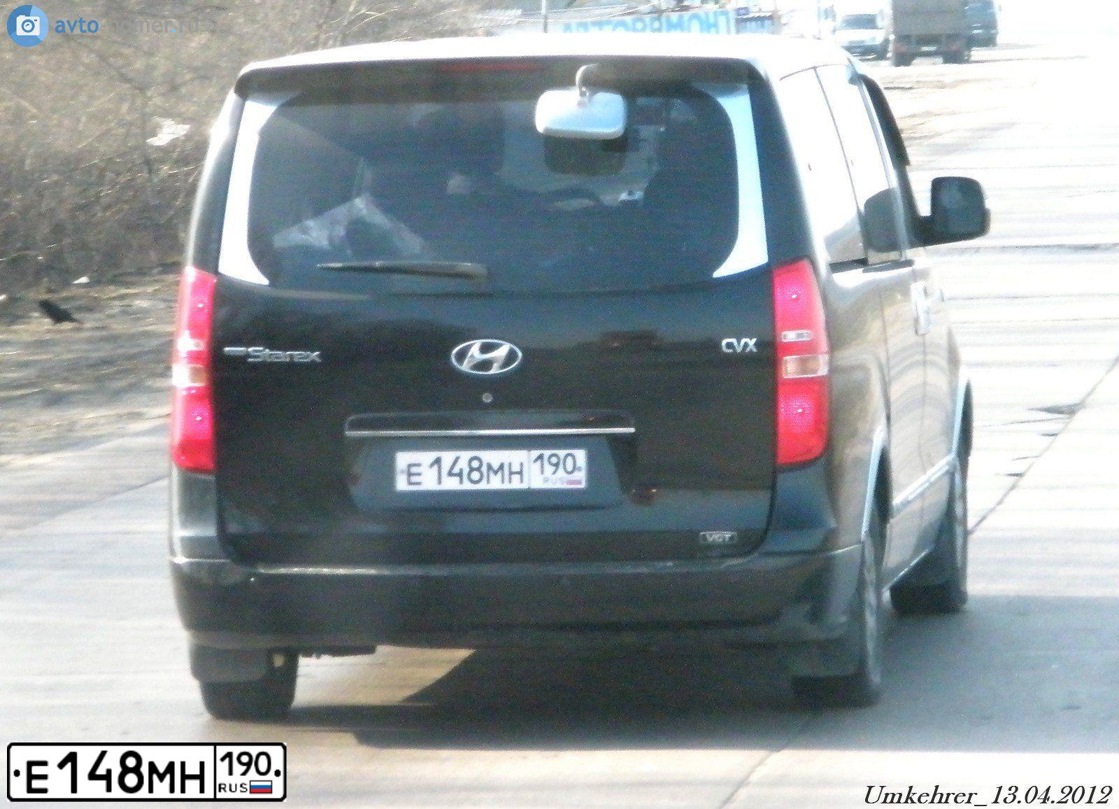 Фото автомобиля HYUNDAI GRAND STAREX, 2009 — госномер К028АК250. Цвет: ЧЕРНЫЙ