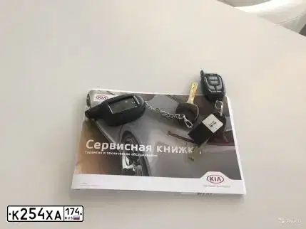 Фото автомобиля KIA RIO, 2017 — госномер К254ХА174. Цвет: ЧЕРНЫЙ