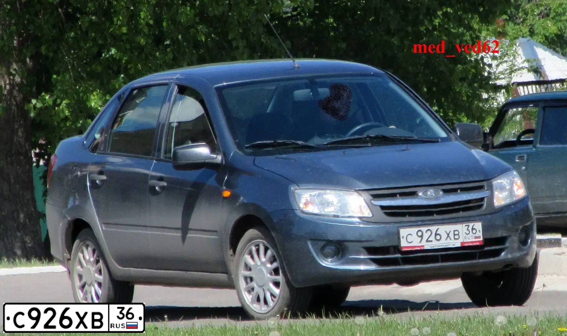 Фото автомобиля LADA 2190 GRANTA, 2013 — госномер С926ХВ36. Цвет: СЕРО-СИНИЙ