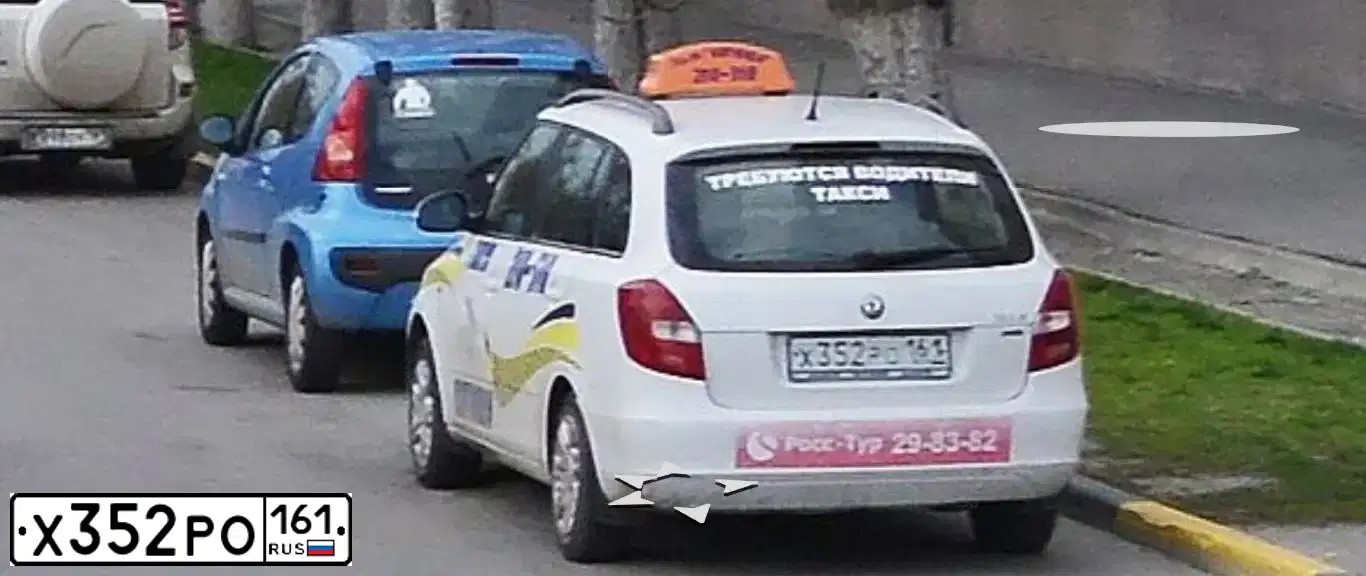Фото автомобиля SKODA FABIA, 2012 — госномер Х352РО161. Цвет: БЕЛЫЙ