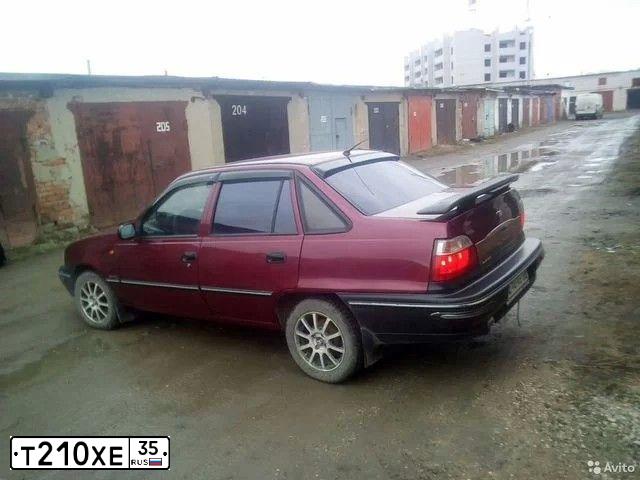 Фото автомобиля DAEWOO NEXIA, 2007 — госномер В151УР76. Цвет: Красный