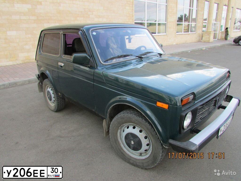 Фото автомобиля ВАЗ 21214, 2007 — госномер Р502НО30. Цвет: Темно-зеленый