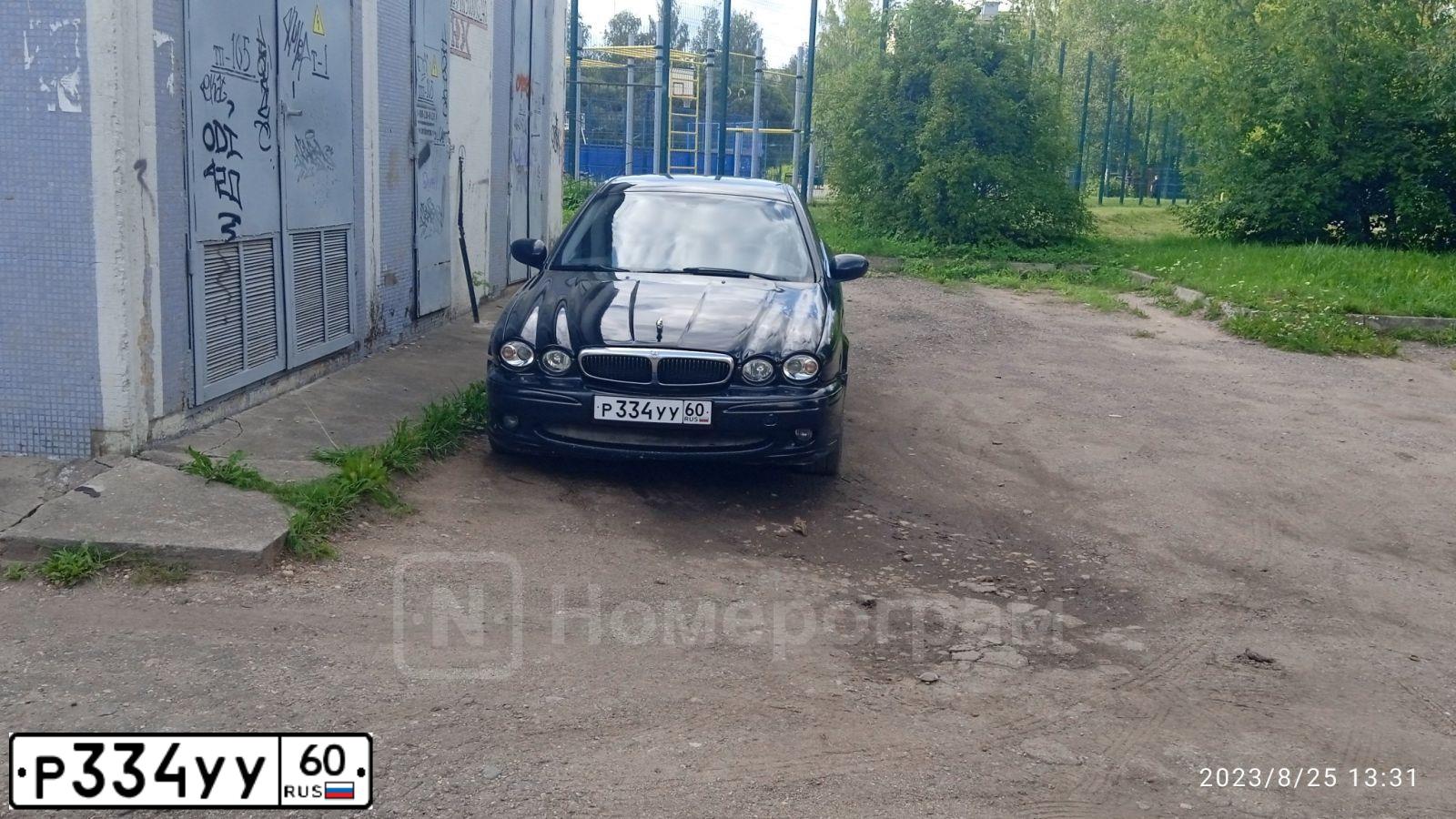Фото автомобиля JAGUAR X-TYPE, 2005 — госномер Р334УУ60. Цвет: ЧЕРНЫЙ