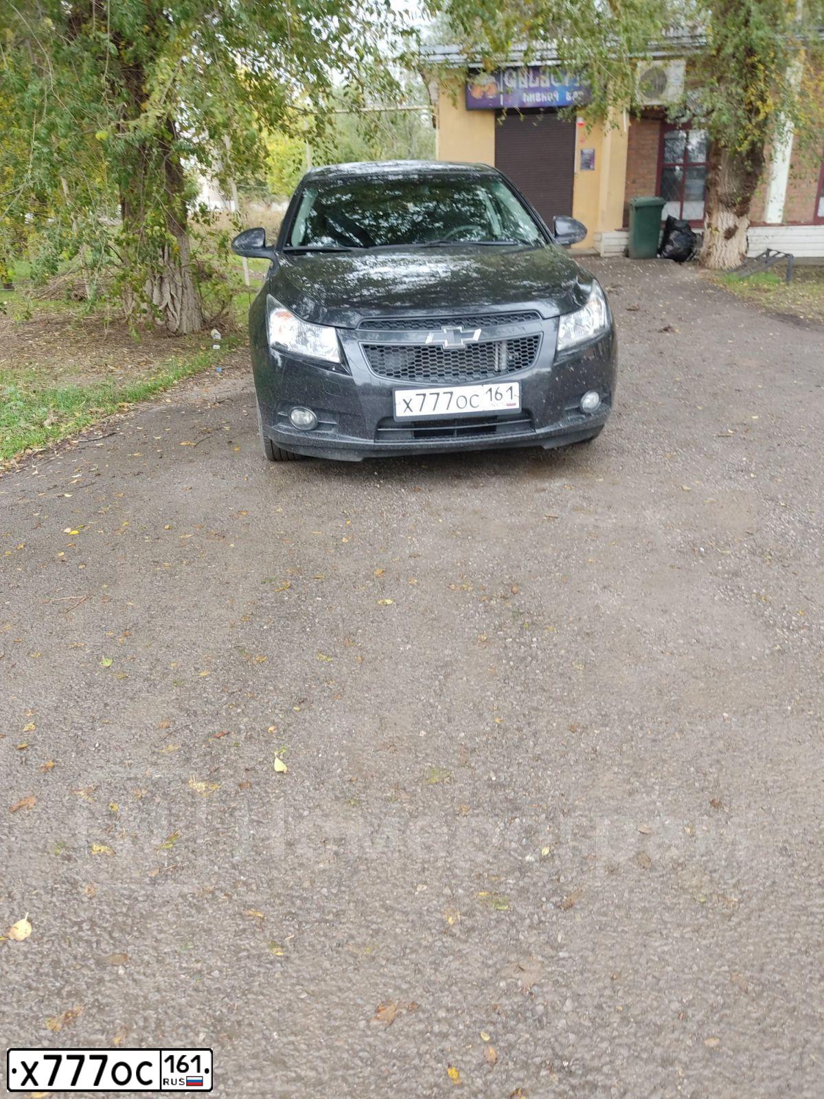 Фото автомобиля CHEVROLET CRUZE, 2011 — госномер Х777ОС161. Цвет: ЧЕРНЫЙ