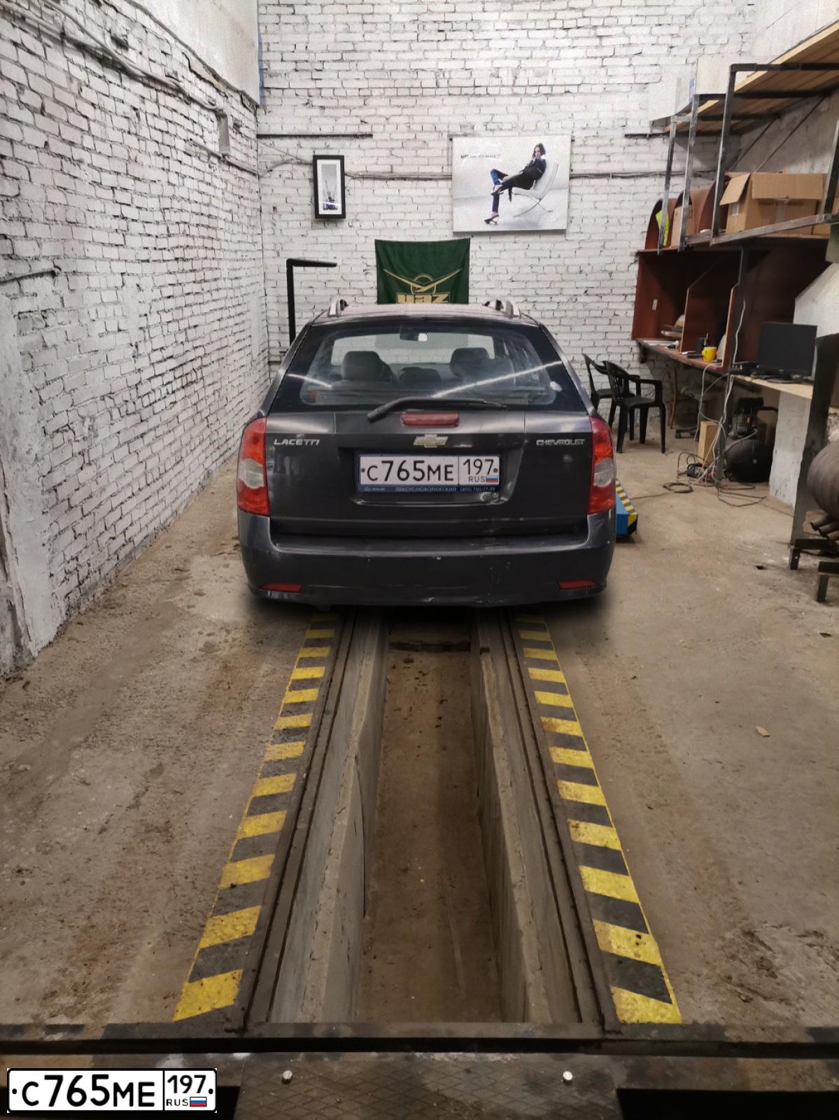Фото автомобиля CHEVROLET LACETTI, 2010 — госномер Н399СС82. Цвет: ЧЕРНЫЙ
